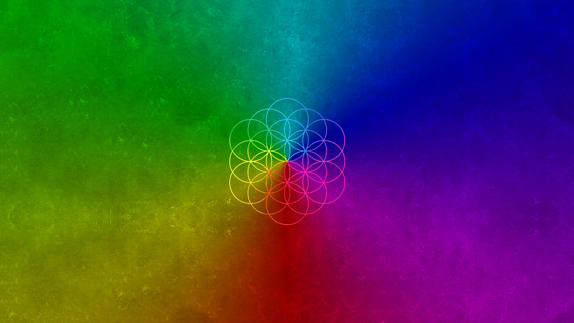 Et farverigt baggrund med et regnbuefarvet mønster Wallpaper