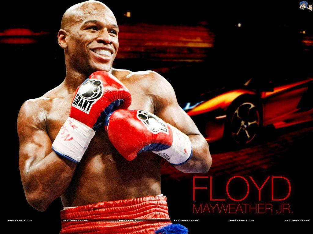 Caption: "Floyd Mayweather Flaunting His Luxurious Car with a Bright Smile" Wallpaper