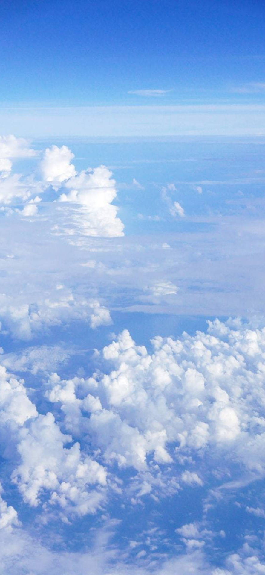 Fnisende skyer lyseblå æstetisk iPhone tapet Wallpaper