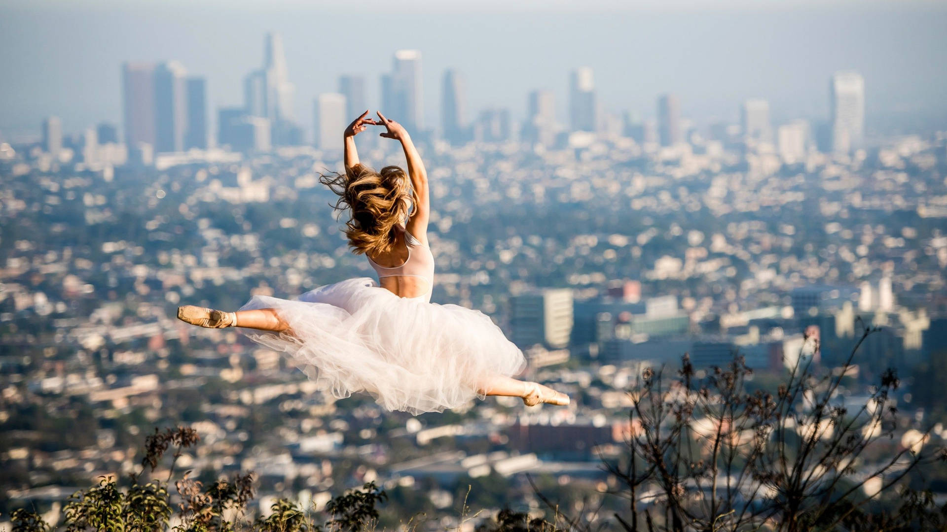 Flying Young City Ballet Dancer Wallpaper
