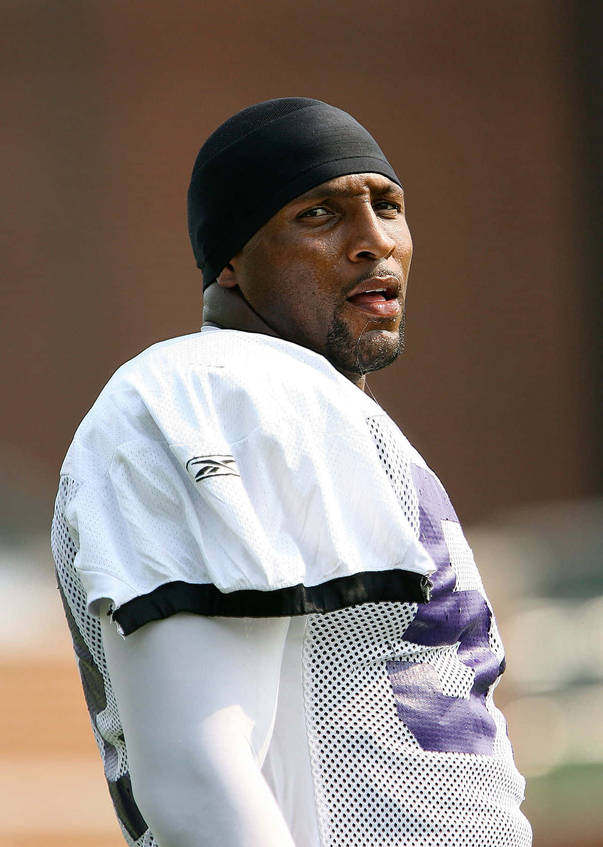 Focused Football Player Ray Lewis Practice Session Wallpaper