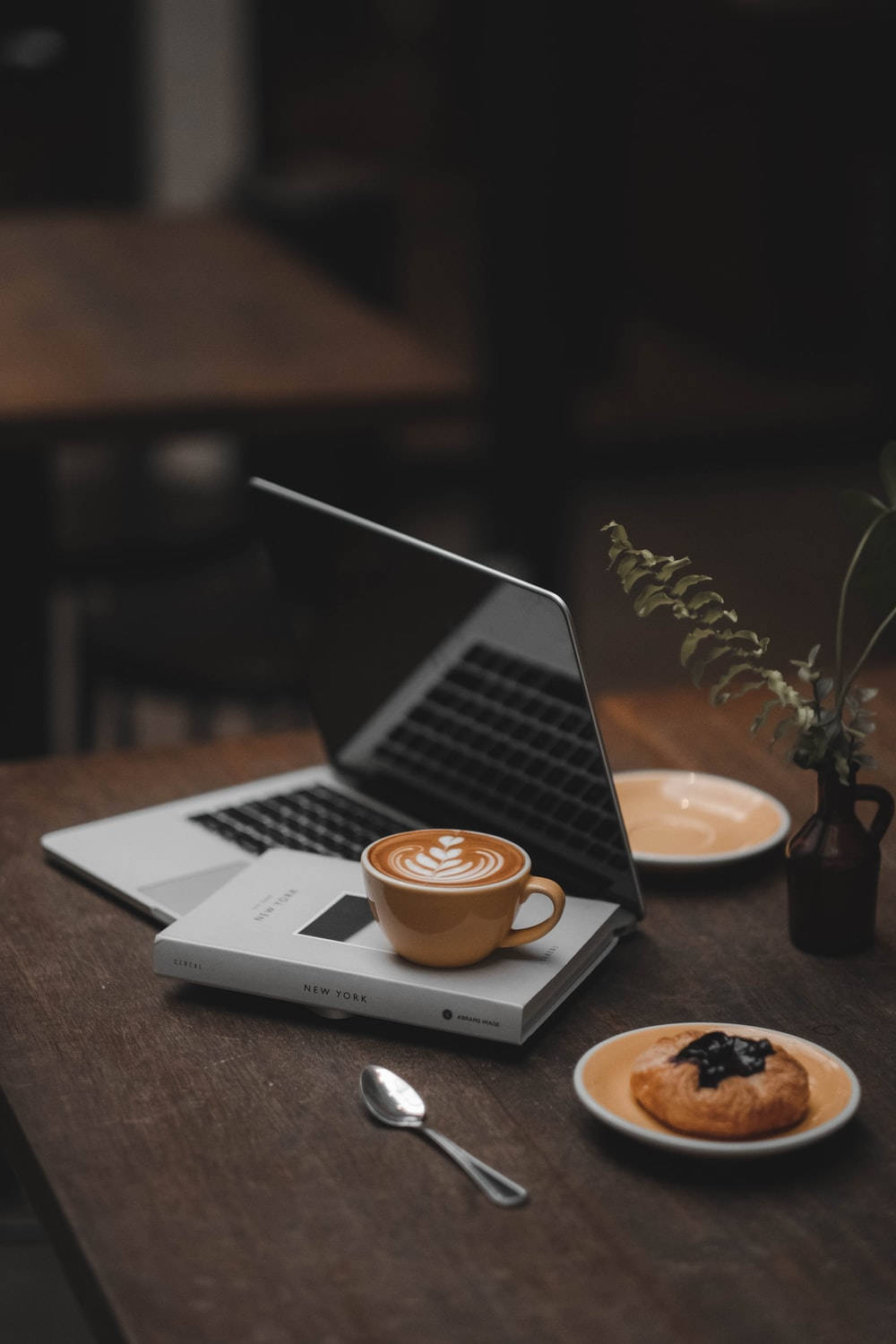 Focused Photography Of Coffee On Laptop Wallpaper