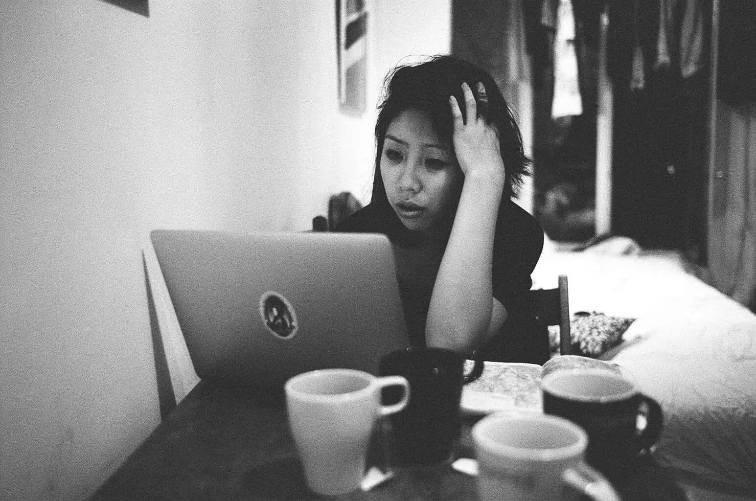 Focusing Woman With Coffee And Laptop Background