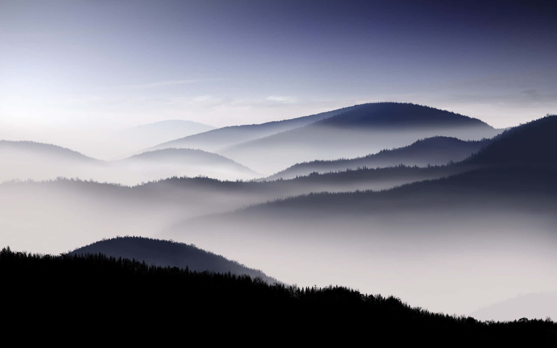 Foggy Mountainous Natural Background Wallpaper