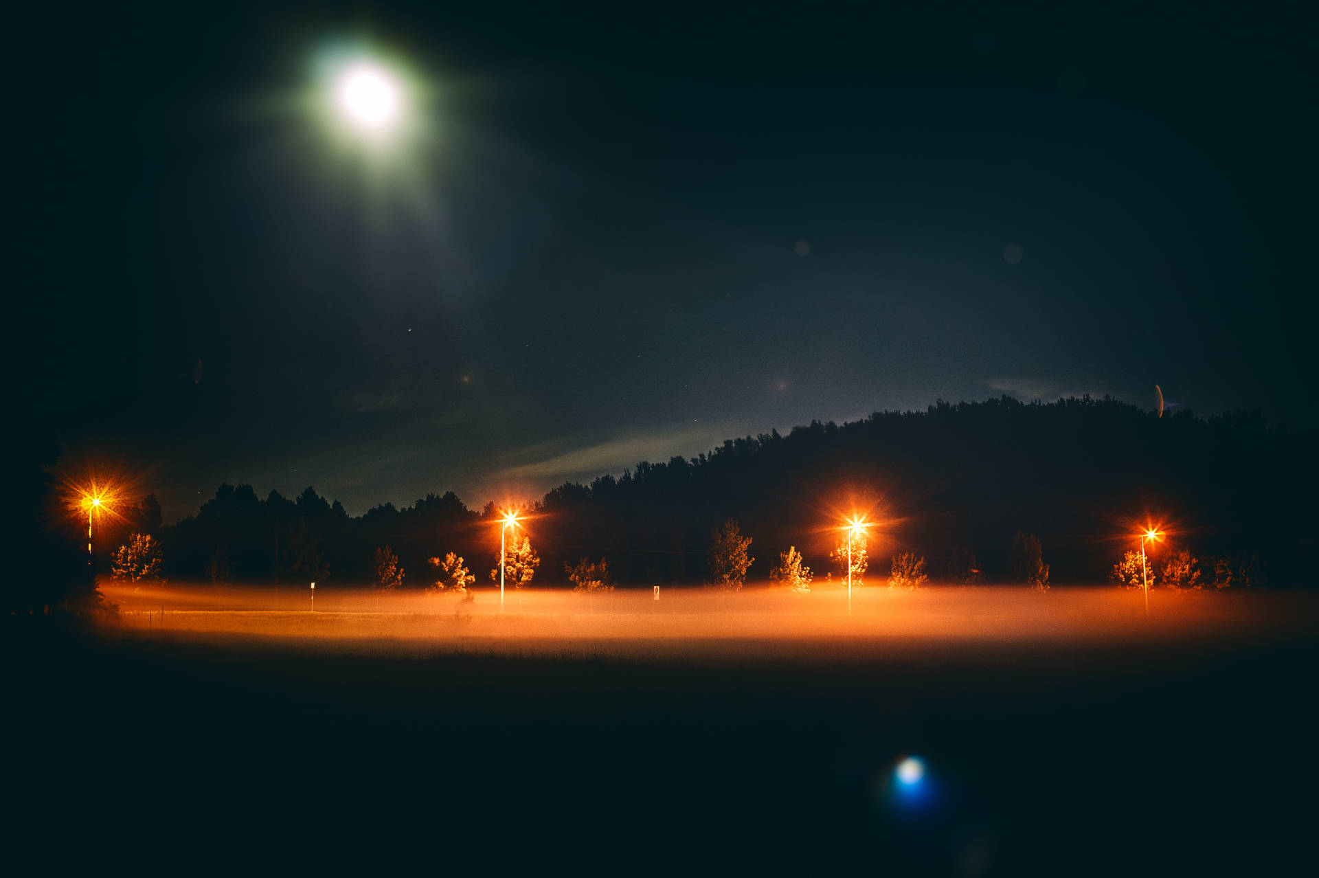 The Moon Lights Up A Foggy Night Wallpaper