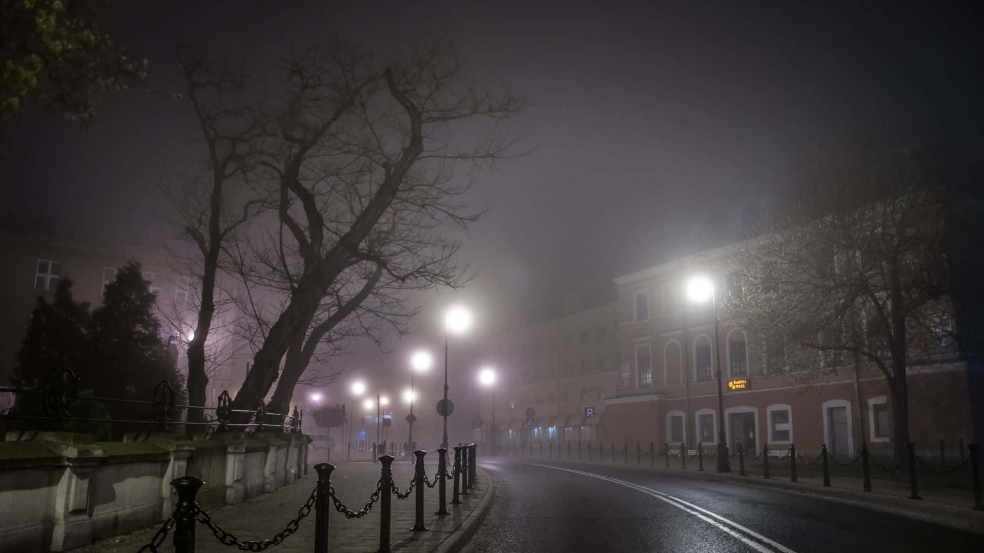 Foggy_ Night_ Street_ Scene Wallpaper