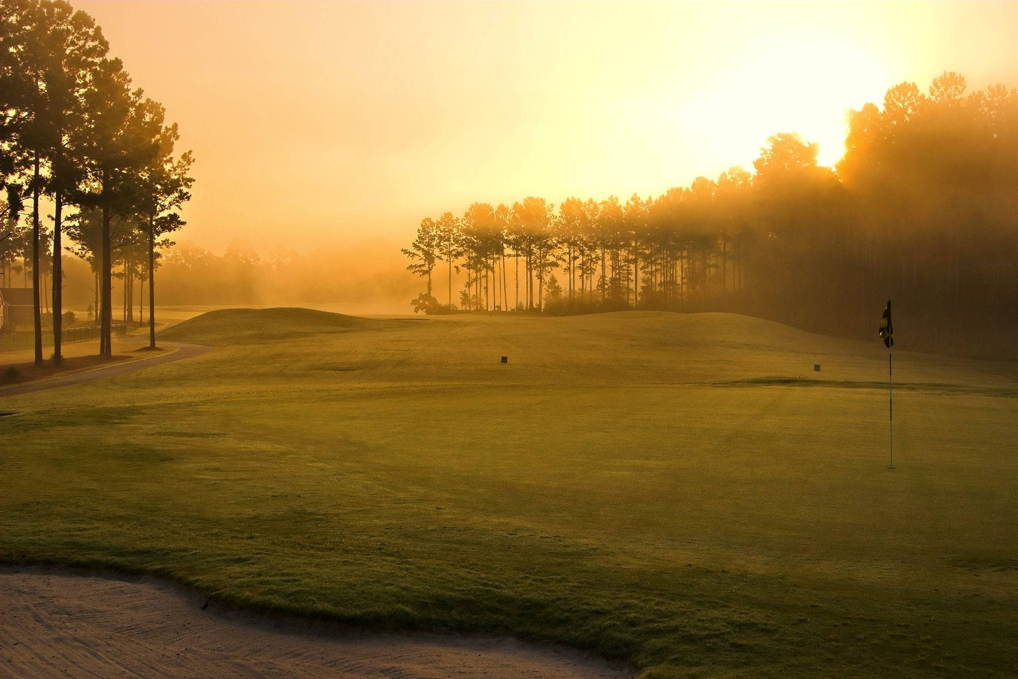 Foggy Sunset On Cool Golf Course Wallpaper