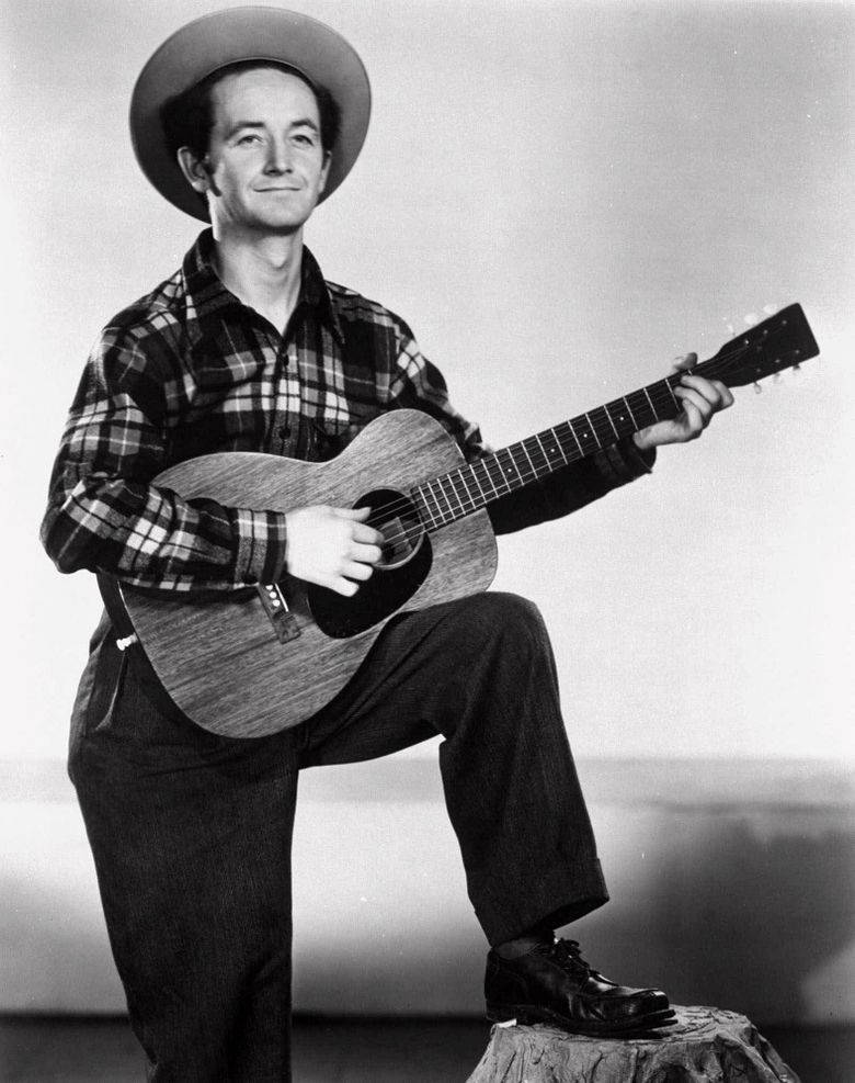 Folksångaren Woody Guthrie. Wallpaper