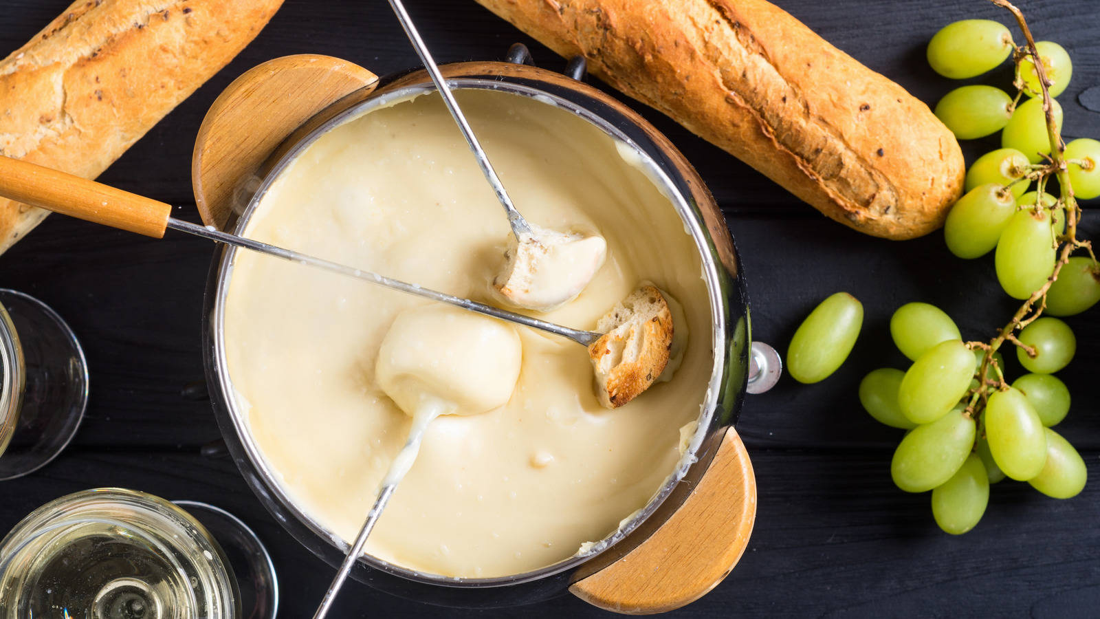 Exquisite Fondue with Fresh French Baguette Wallpaper