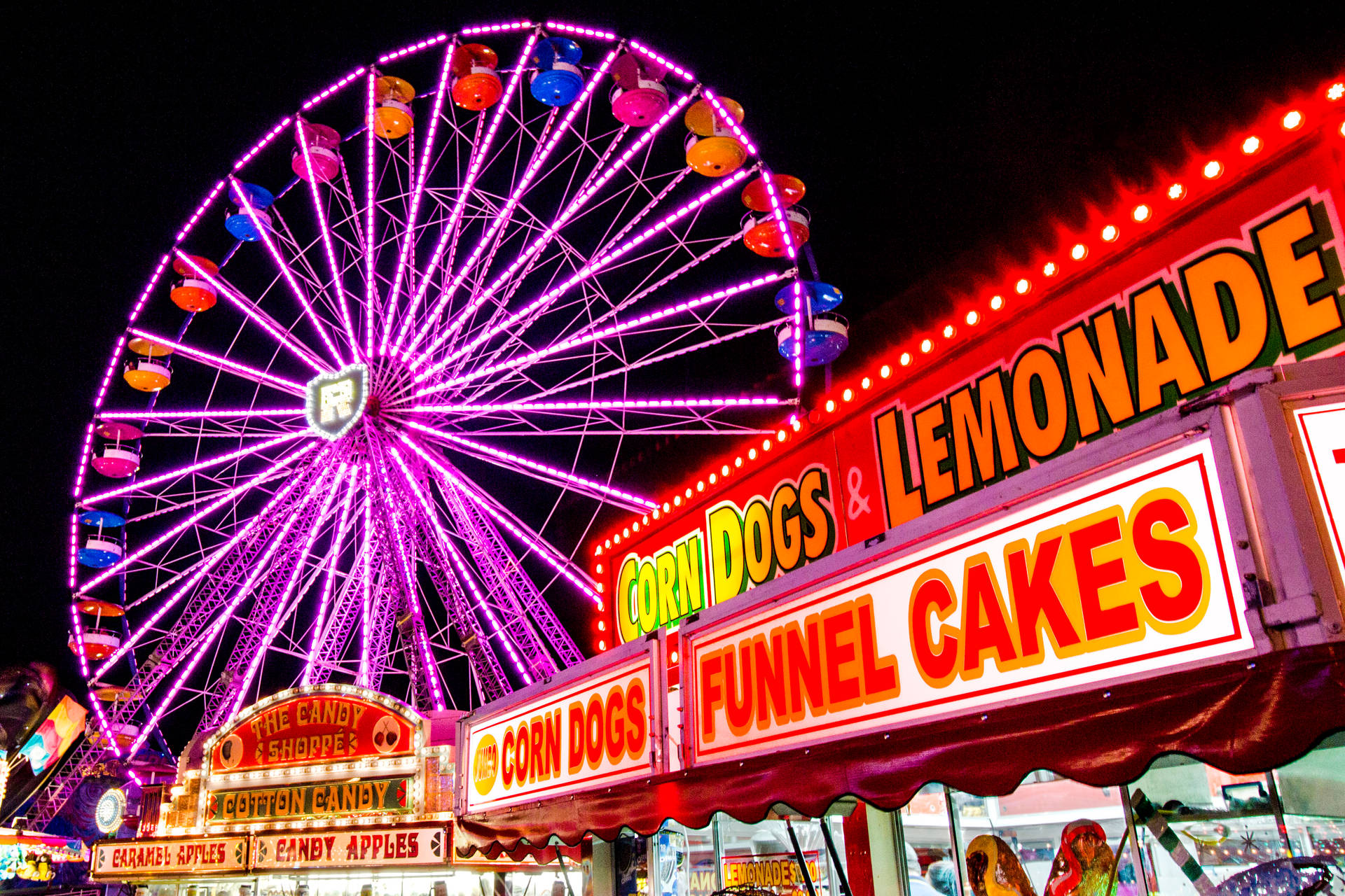 Vibrant Food Booths at the Annual Fair Wallpaper