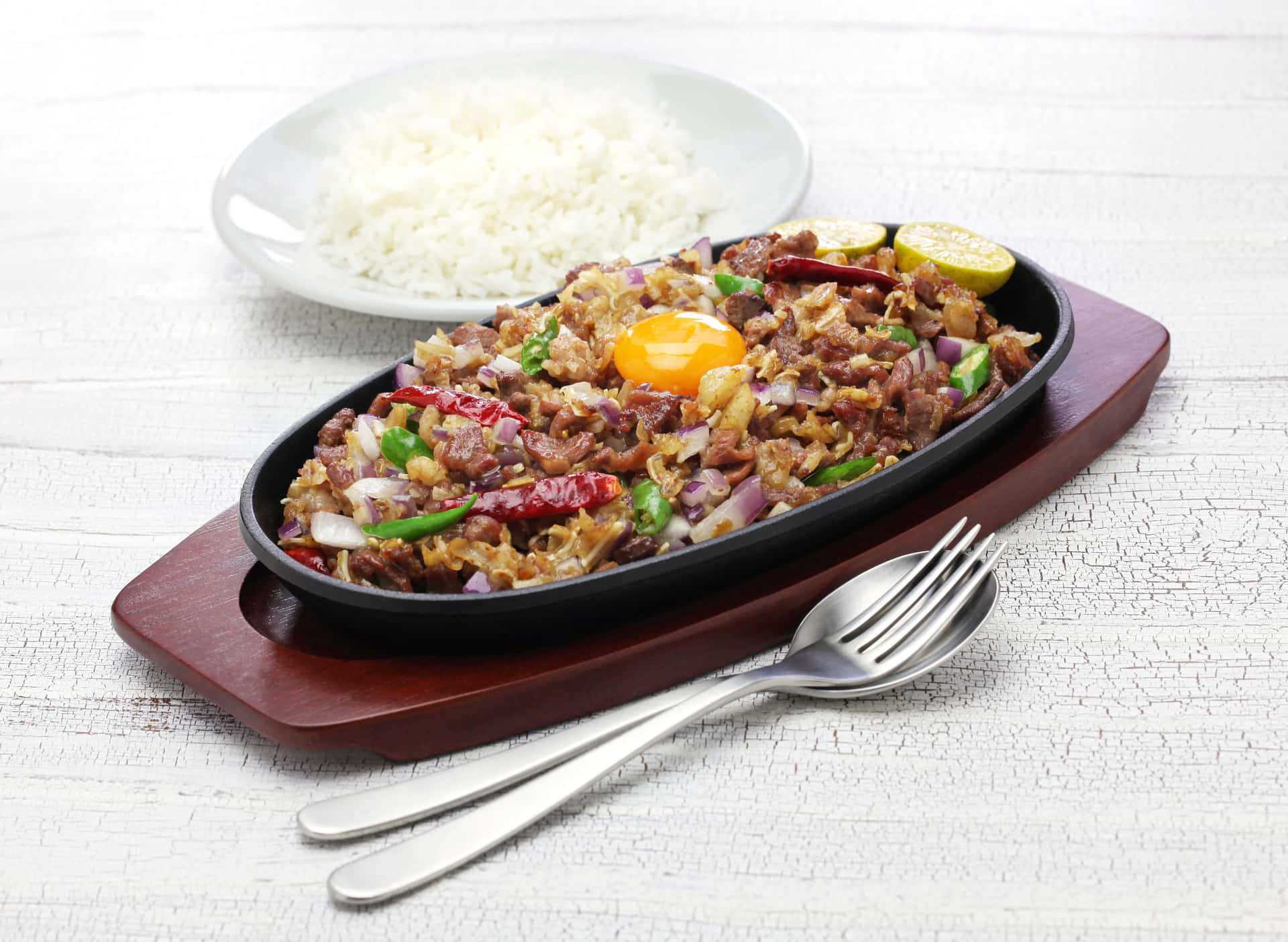 A Plate With Rice And Meat On It