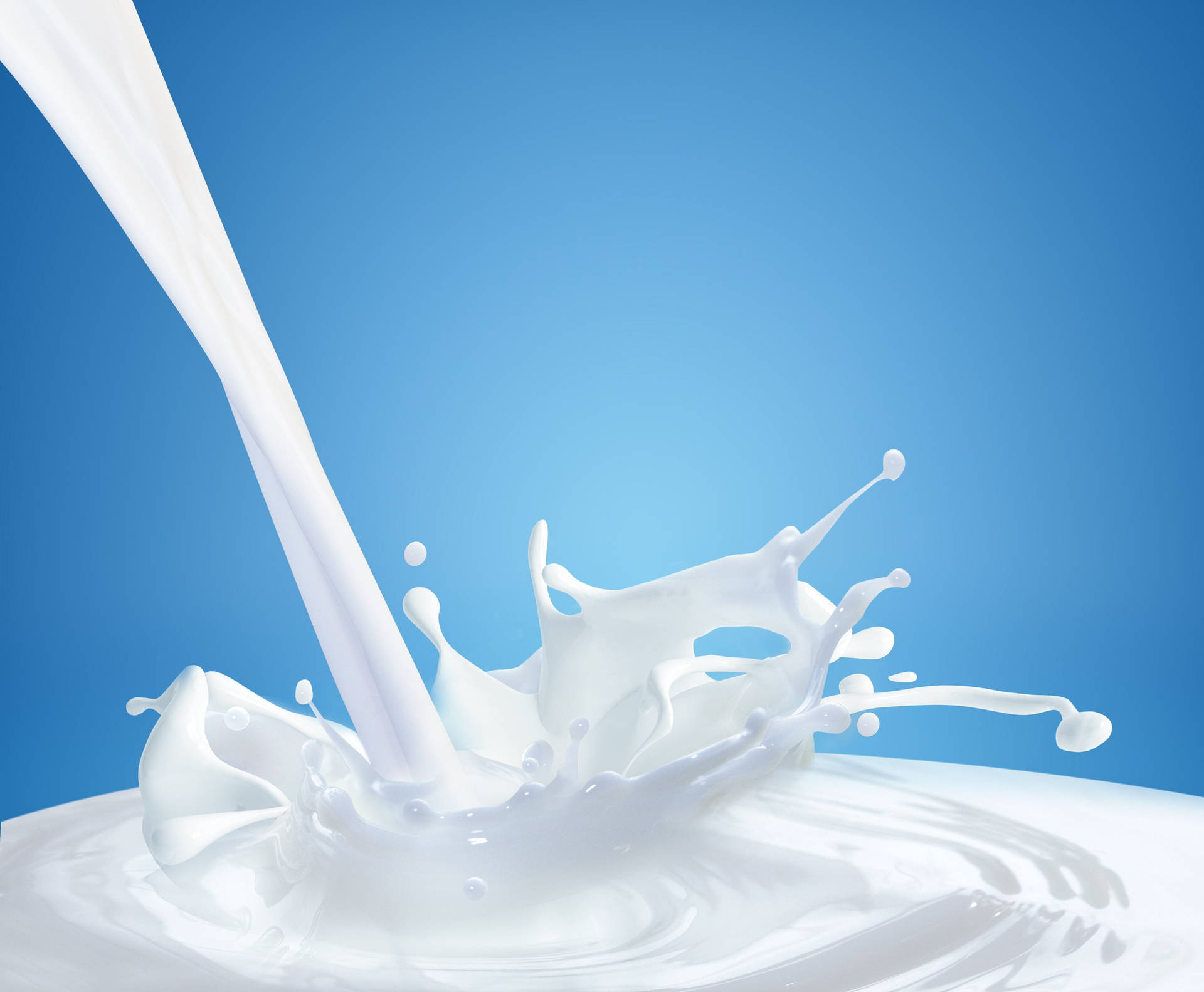 Lebensmittelfotografiemit Spritzender Milchflüssigkeit Wallpaper