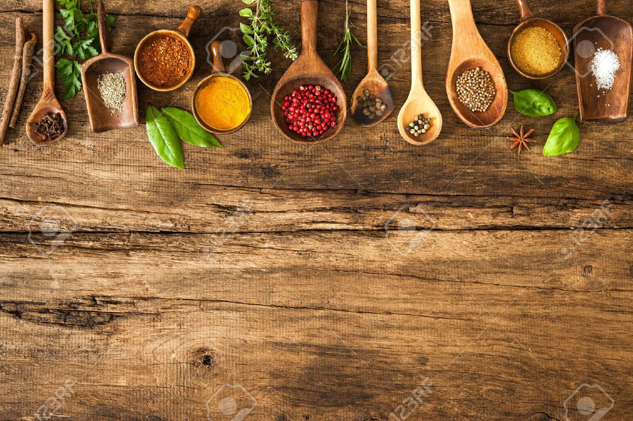 Spices And Herbs In Wooden Spoons On Wooden Background Stock Photo - Etsy Wallpaper