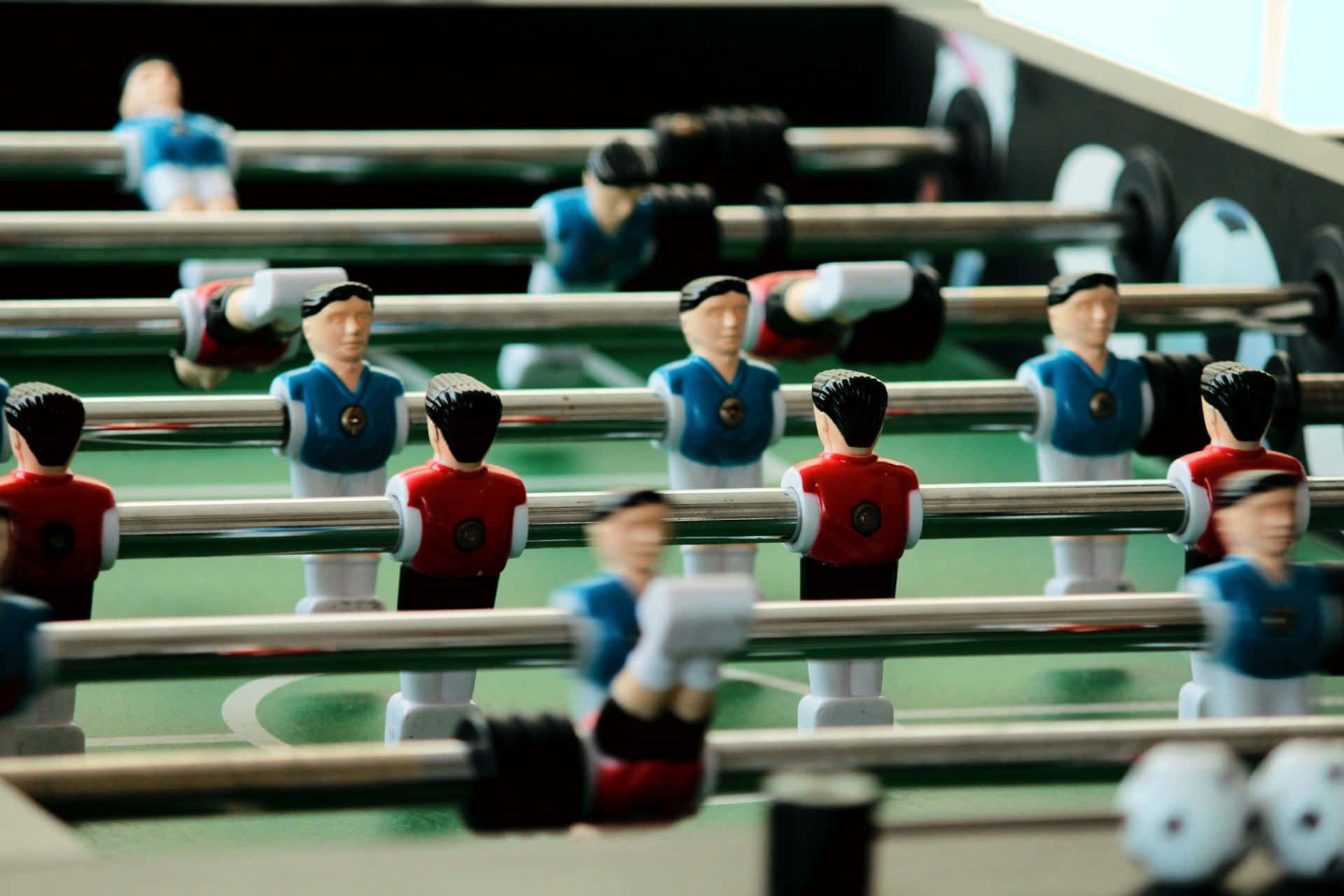 Foosball Table Game Action Wallpaper