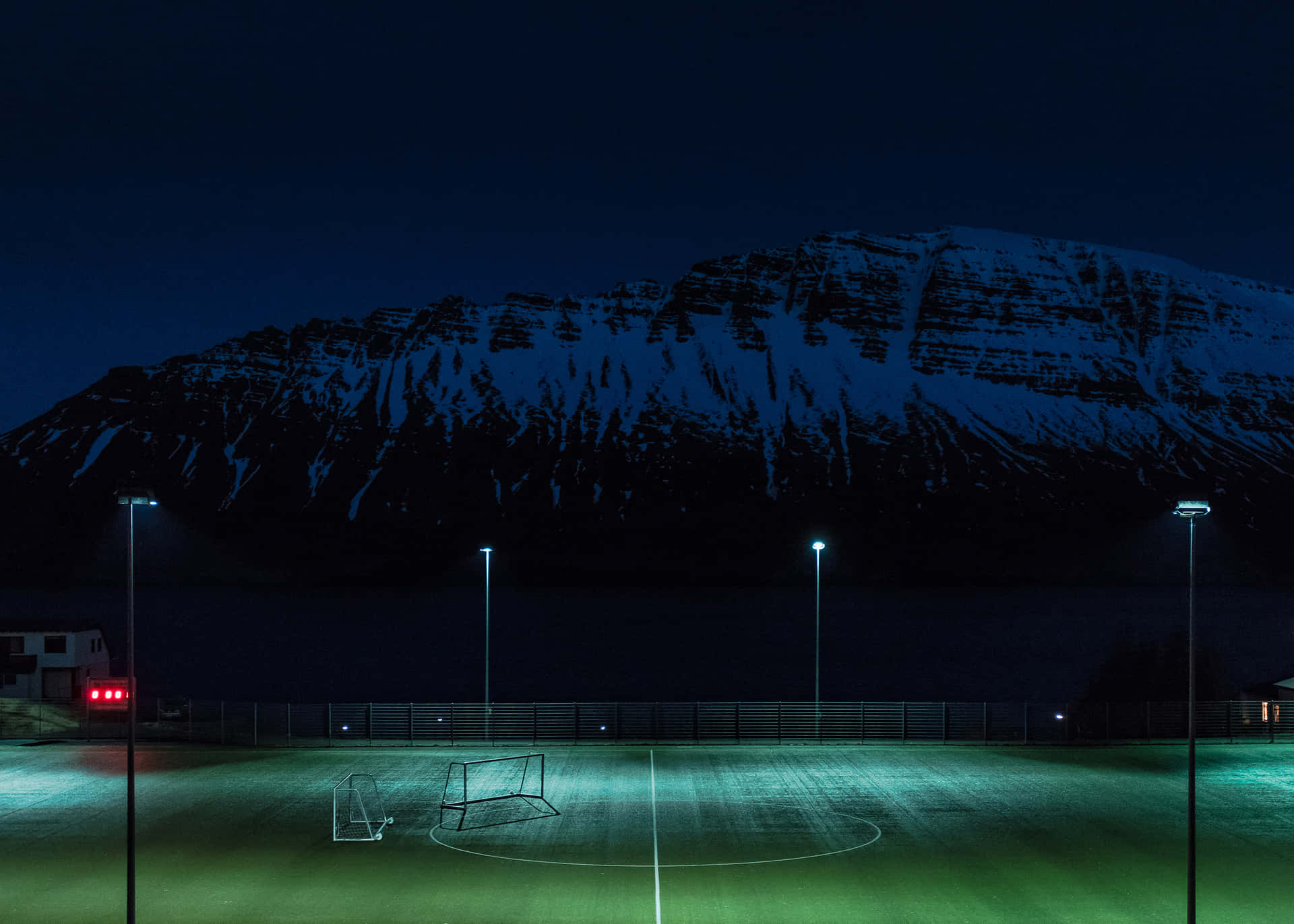 Football Field During Night Time Picture