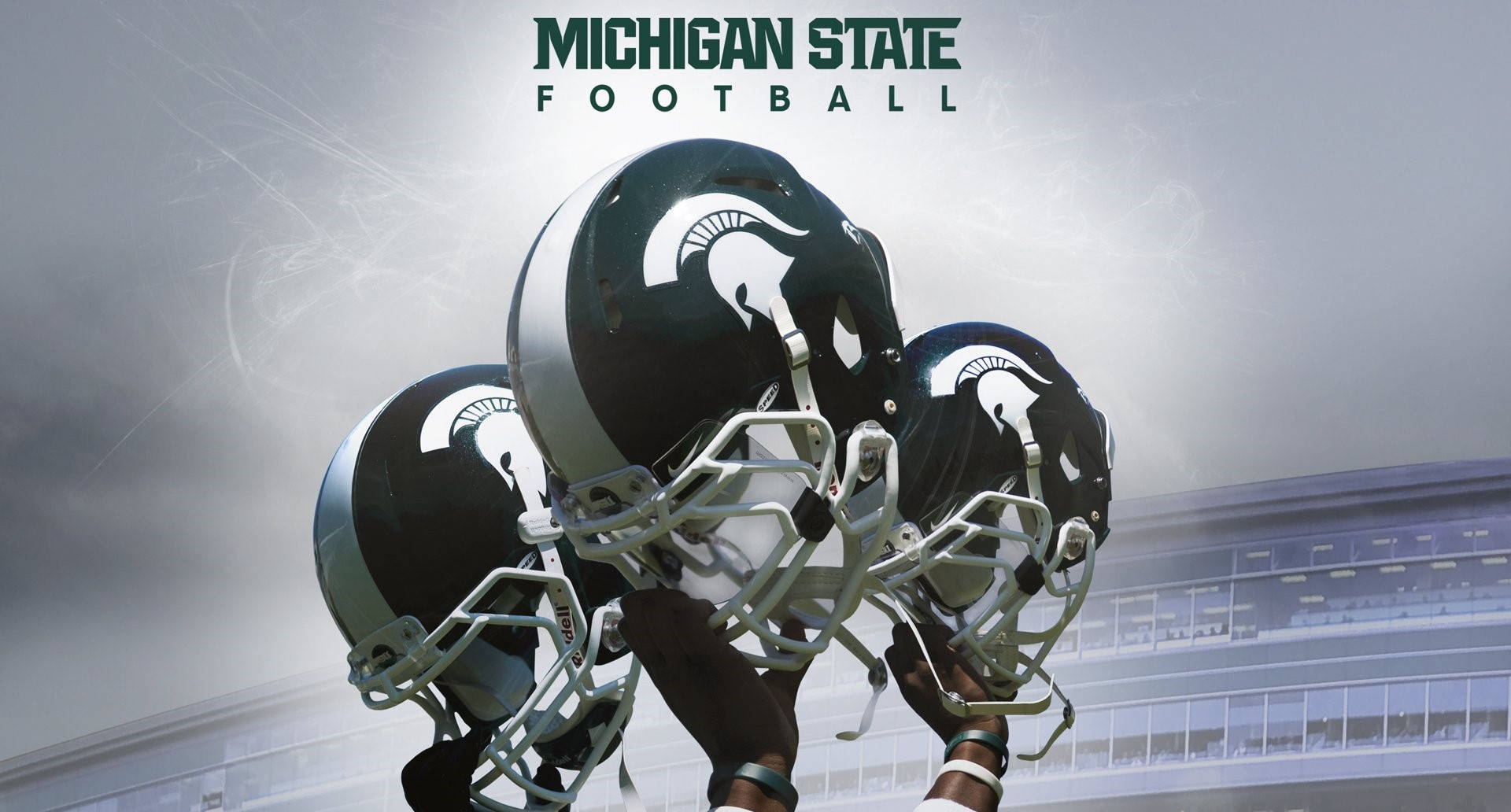Footballhelme Der Michigan State University Wallpaper
