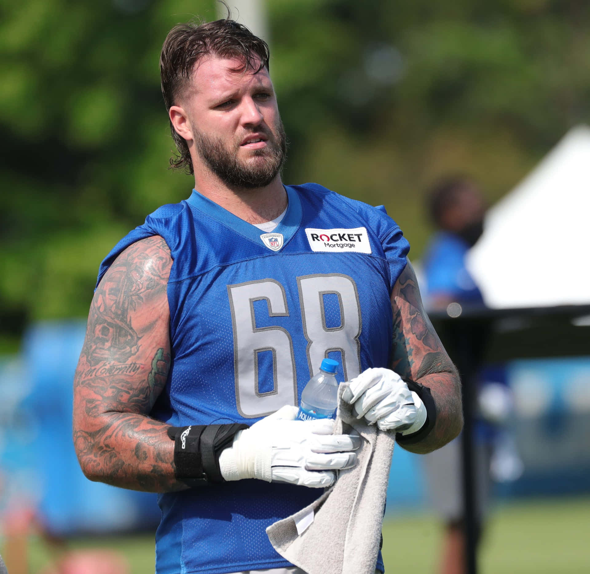 Football Offensive Tackle Athlete Taylor Decker Wallpaper