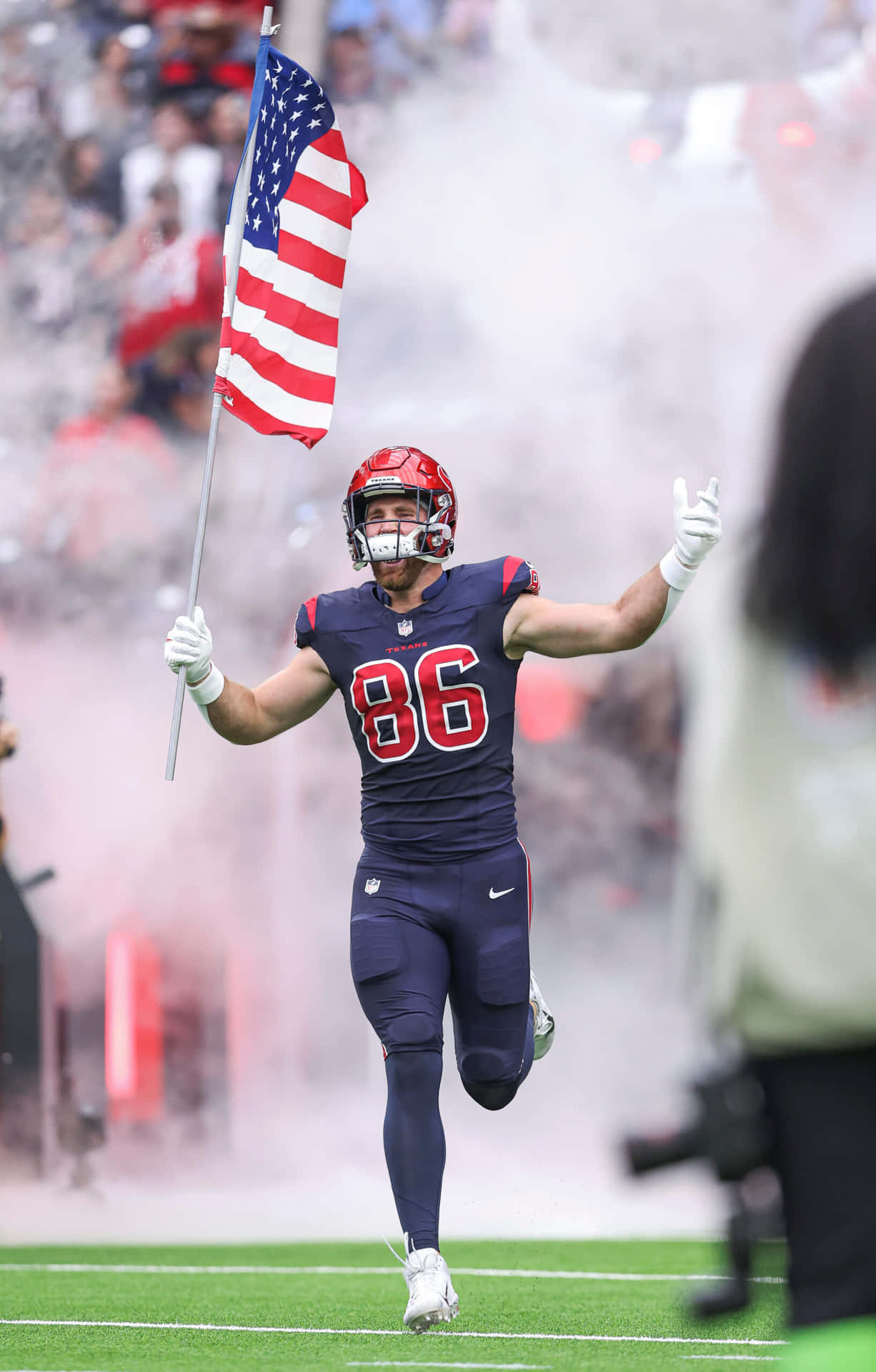 Football Player Carrying American Flag Wallpaper