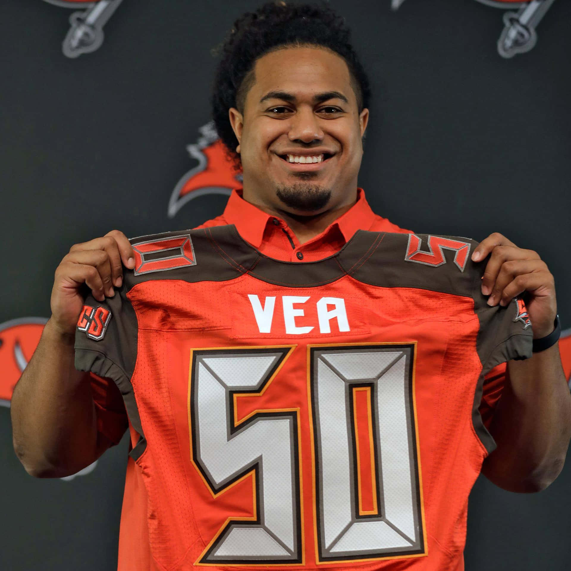 Football Player Holding Jersey Number50 Wallpaper