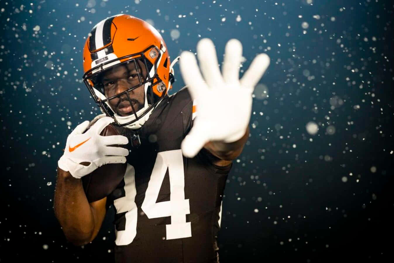 Football_ Player_ Number_34_ Snowflakes_ Background Wallpaper