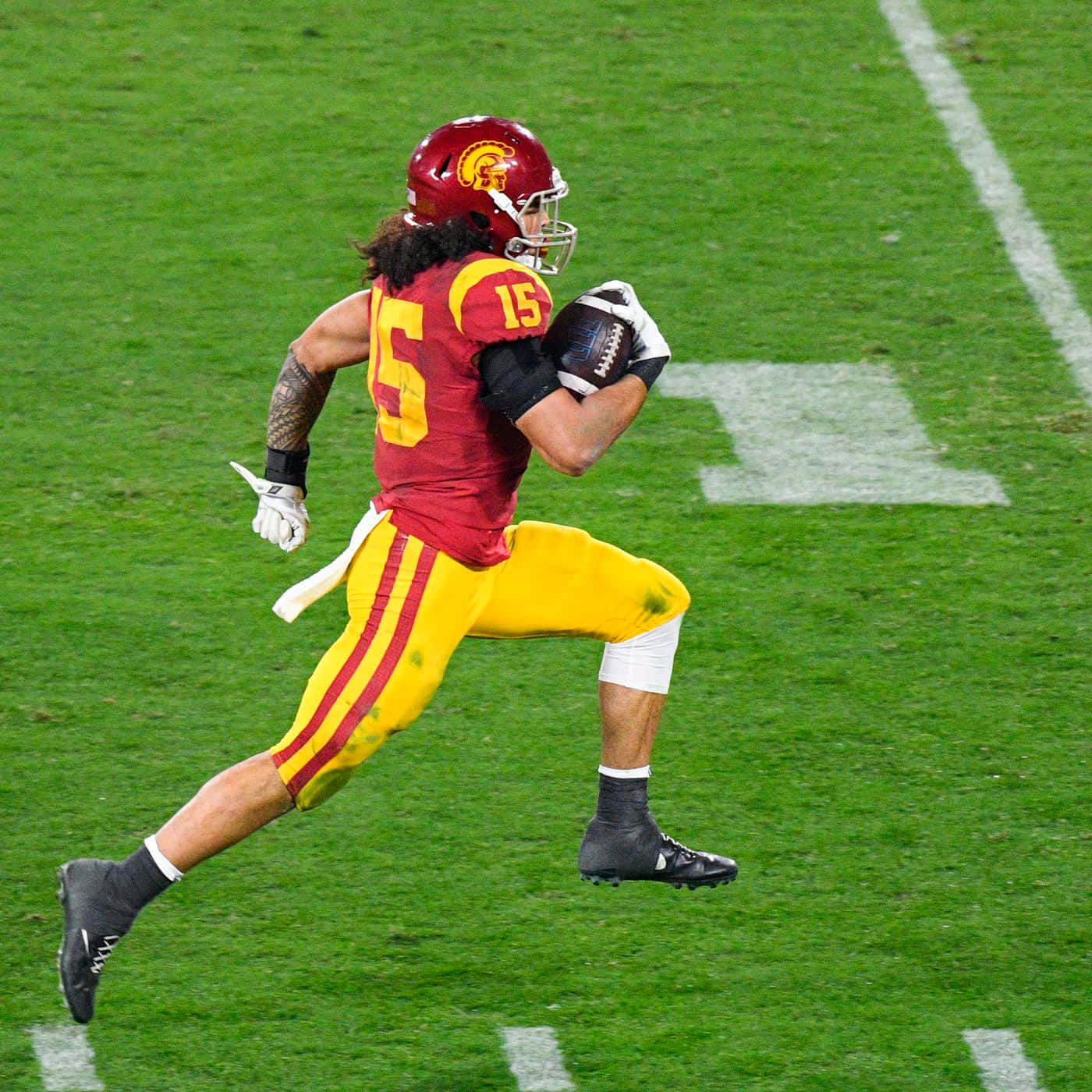 Football Player Running With Ball Wallpaper