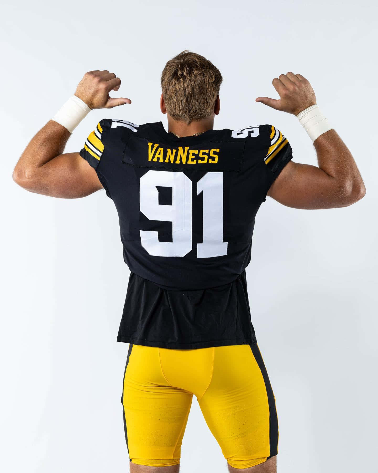 Football Player Showing Number91 Jersey Wallpaper