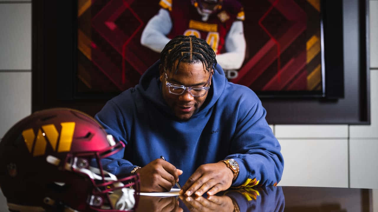 Football Player Signing Contract Wallpaper