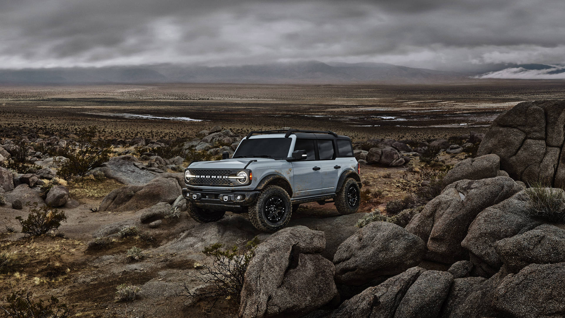 Ford Bronco In Vast Deserted Field Background