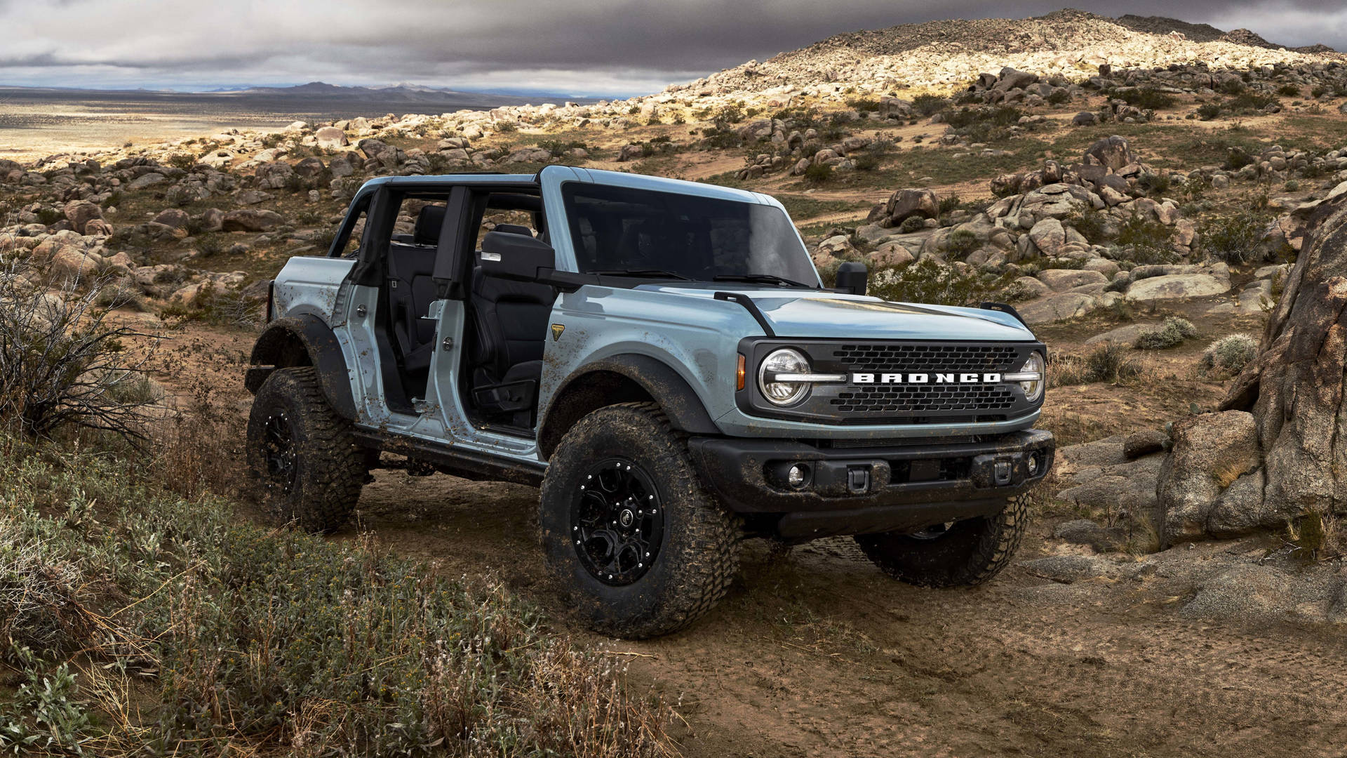 Ford Bronco On Rocky Trail Background