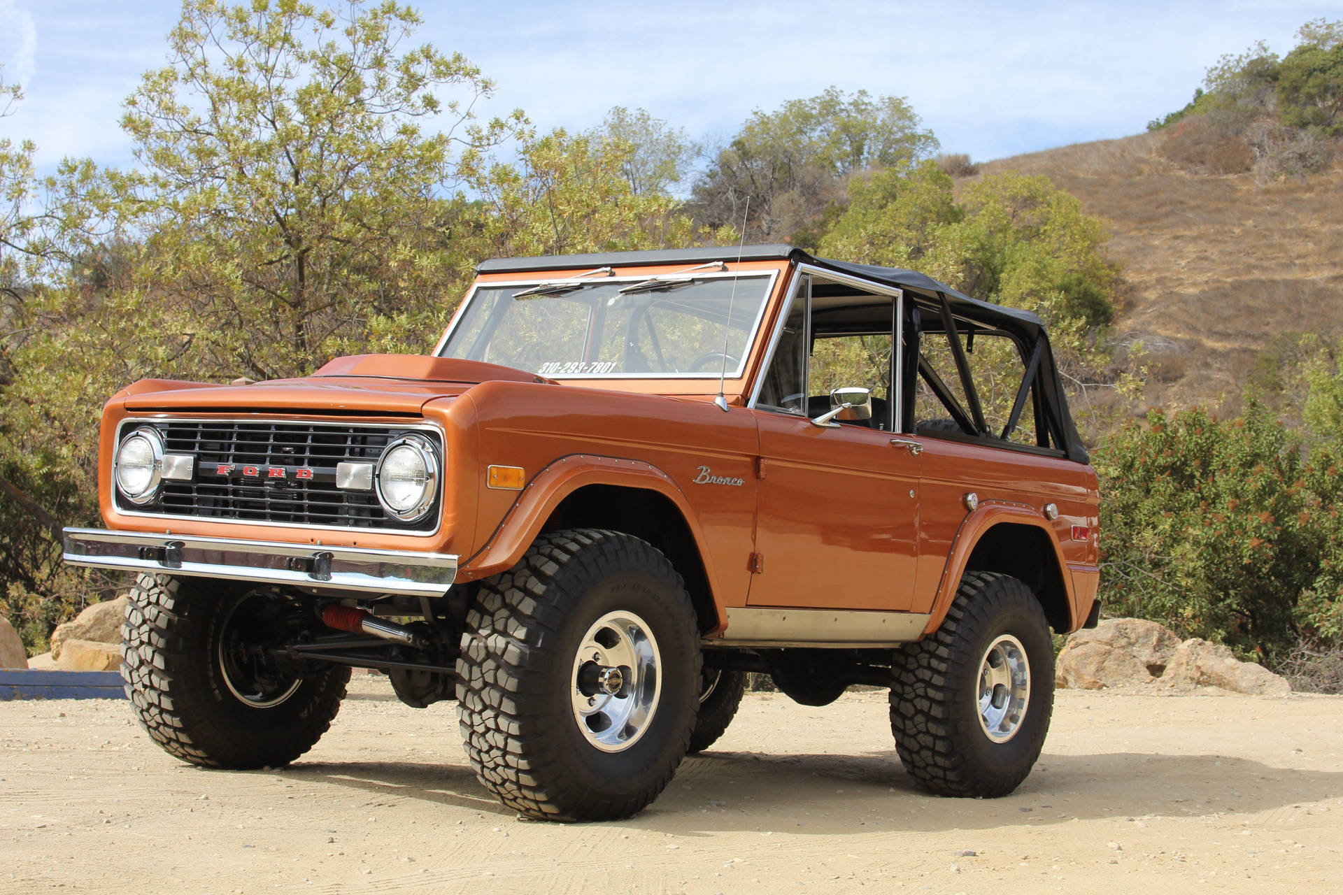 Ford Bronco Parked In Dirt Road