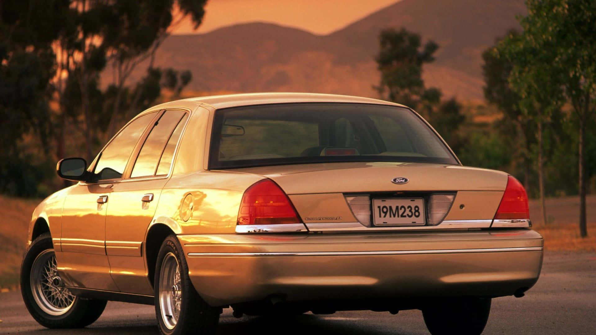 Classic Ford Crown Victoria on the road Wallpaper