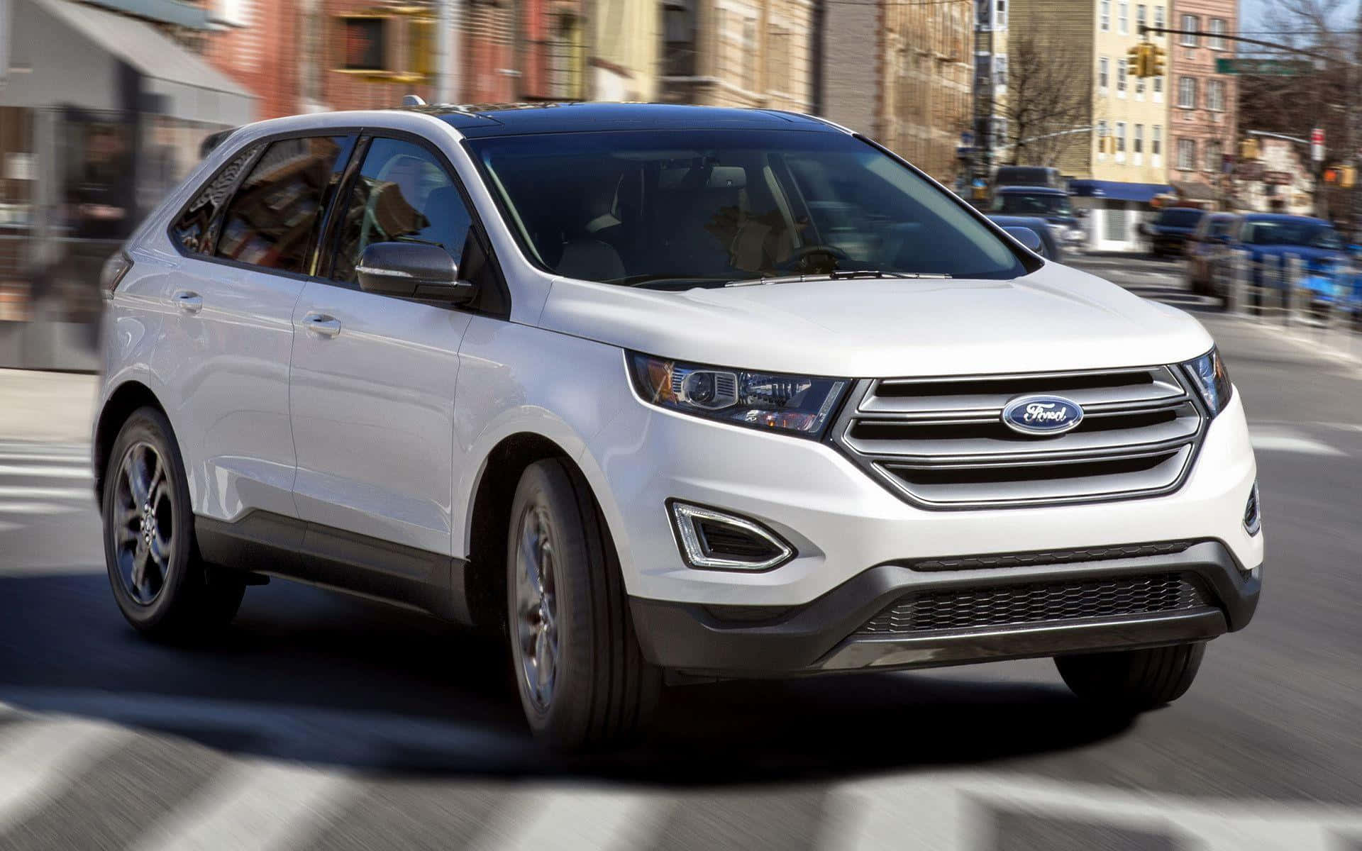 Caption: Sleek and Stylish Ford Edge on the Road Wallpaper
