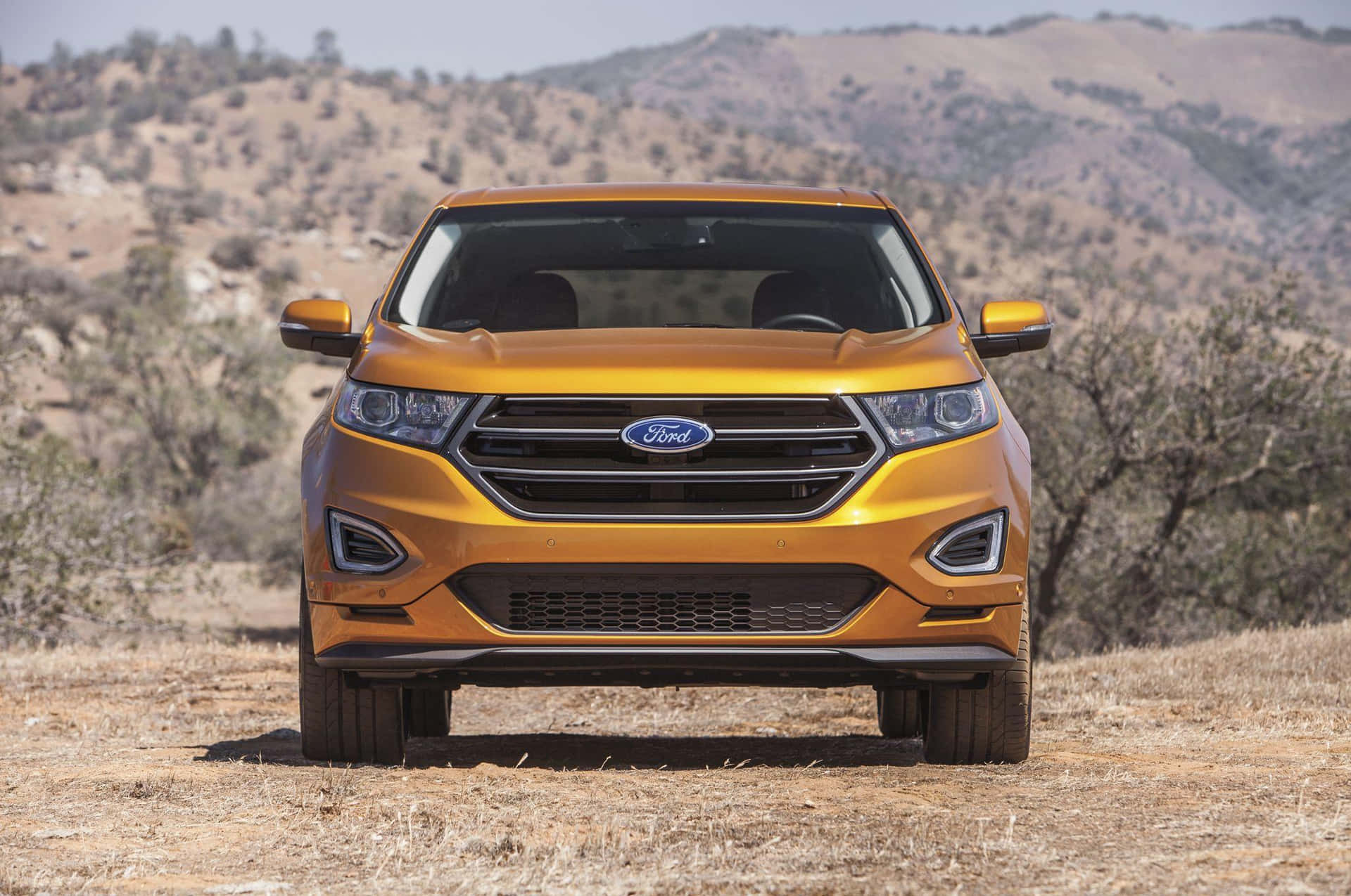 Sleek 2023 Ford Edge on an open road Wallpaper