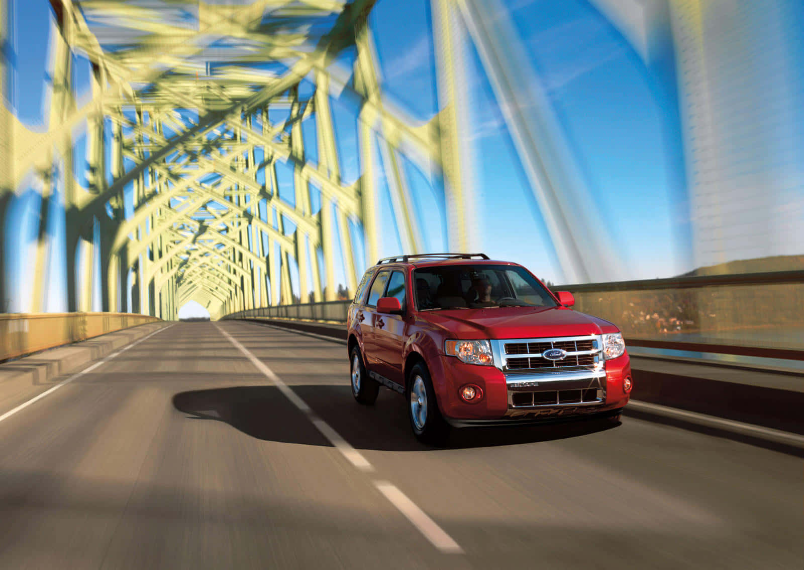 Sleek Ford Escape on a Scenic Drive Wallpaper