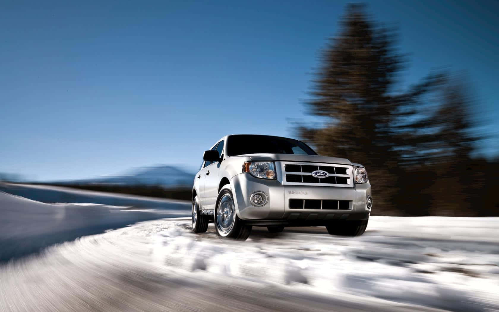 Caption: Sleek Ford Escape on Scenic Road Wallpaper