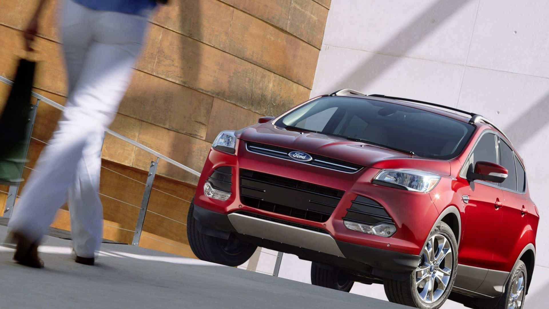 Sleek Ford Escape cruising on the highway Wallpaper