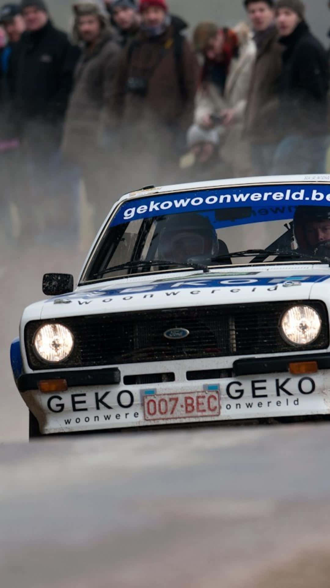 Classic Ford Escort in Action Wallpaper