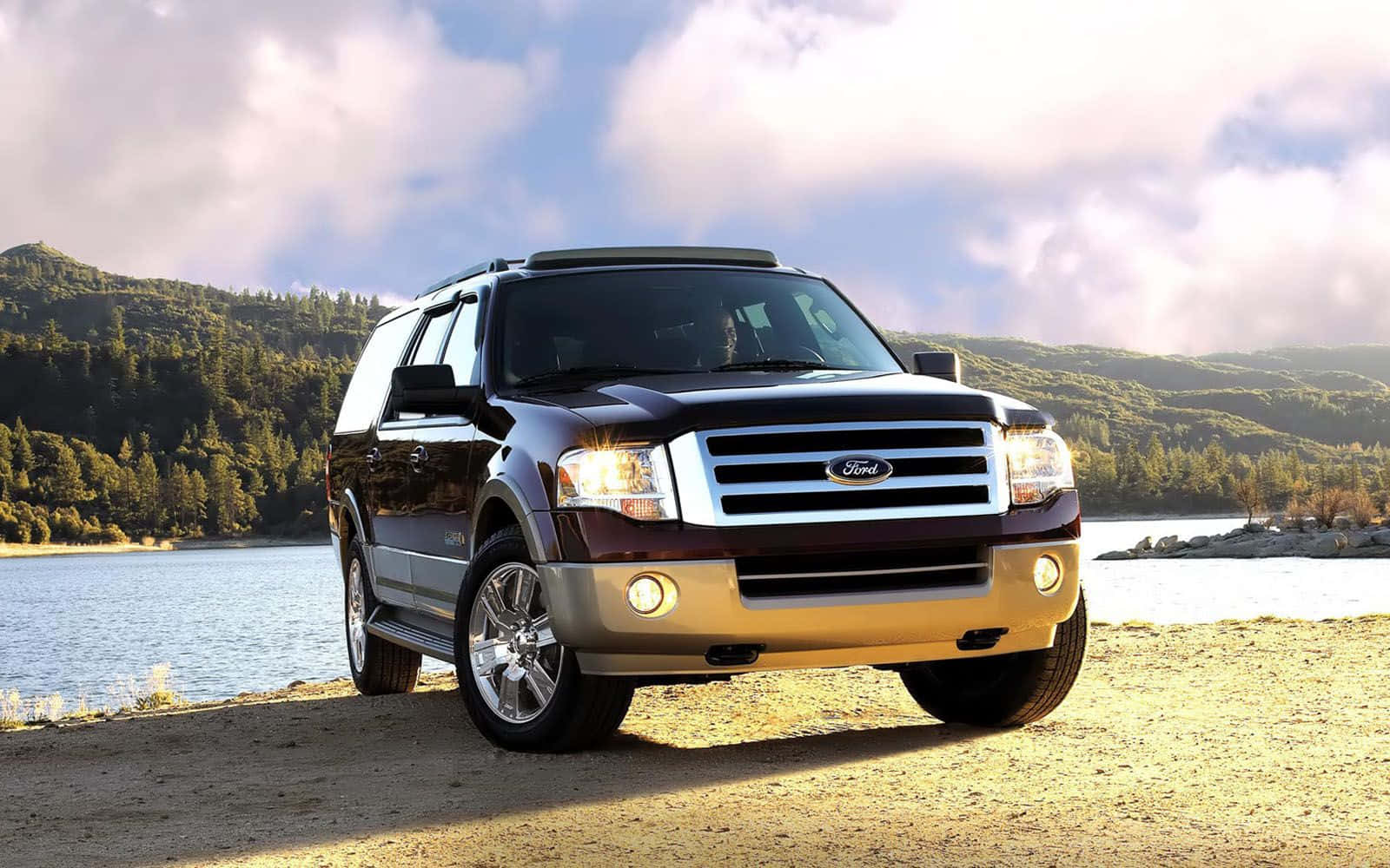 Powerful Ford Expedition cruising on the road Wallpaper