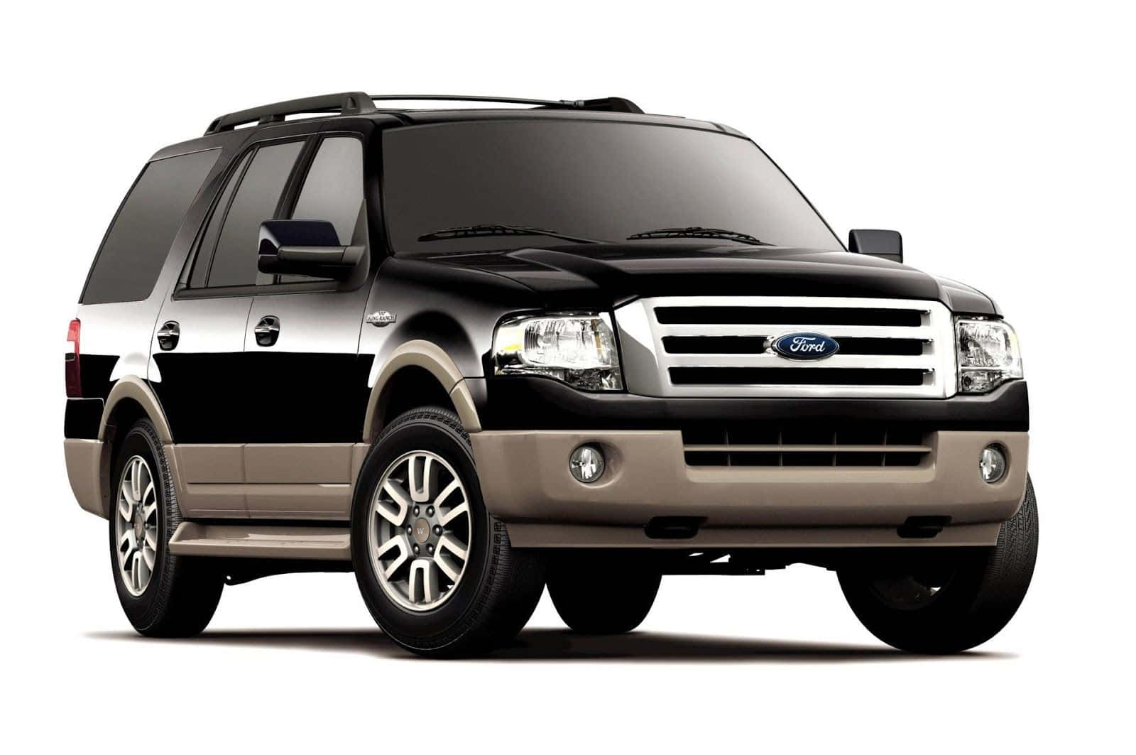 Sleek Ford Expedition cruising in a picturesque landscape Wallpaper