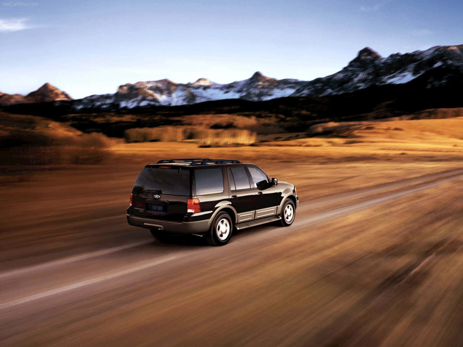 Stunning Ford Expedition cruising on the open road Wallpaper