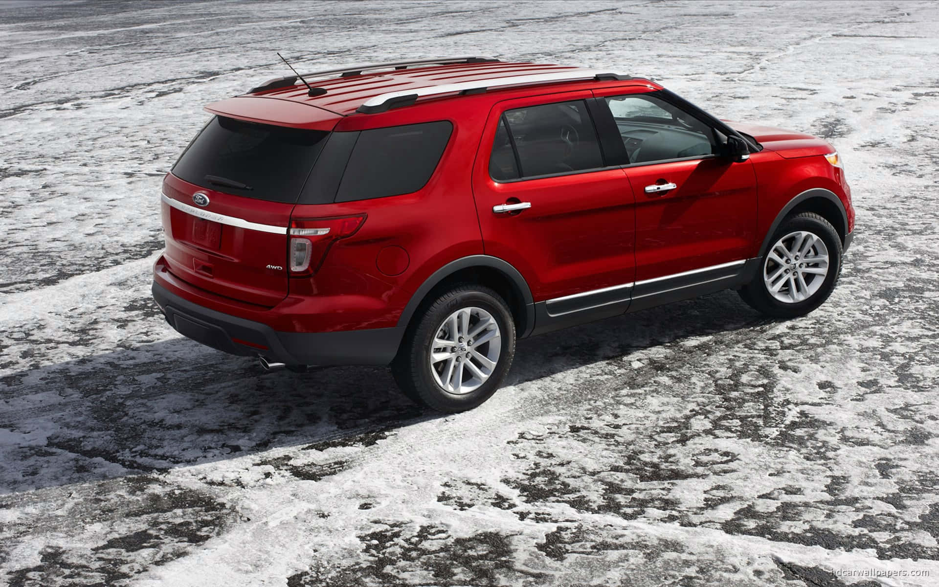 A Sleek and Powerful Ford Explorer on the Road Wallpaper