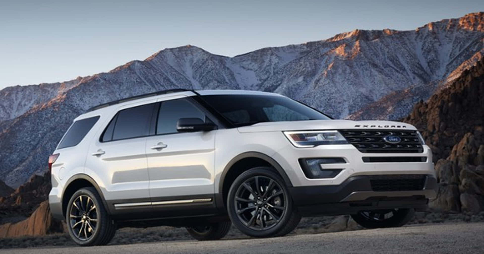 The Sleek and Stylish Ford Explorer on an Adventure Wallpaper