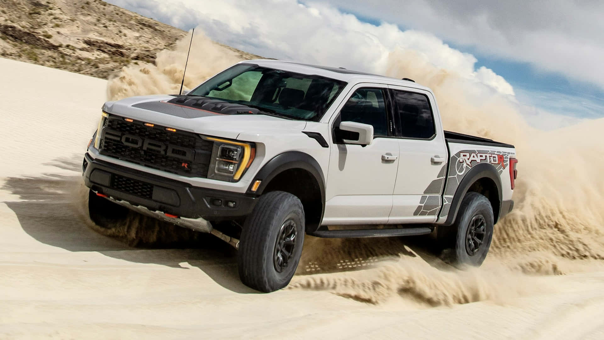 The 2019 Ford F-150 Raptor Is Driving Through The Desert Wallpaper