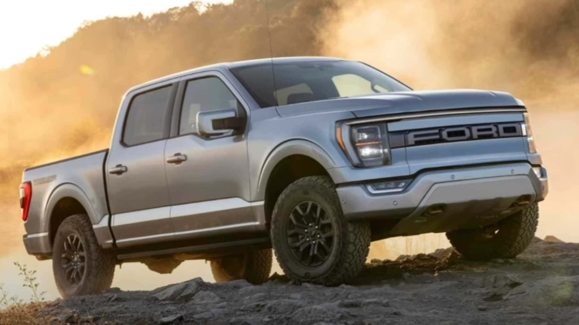 The 2020 Ford F - 150 Is Driving On A Rocky Road Wallpaper