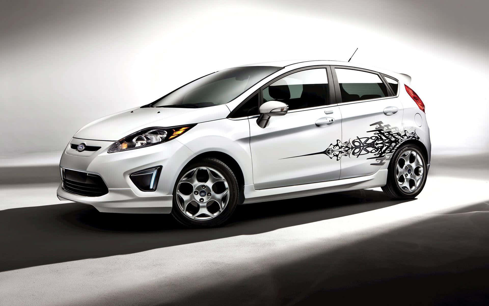 Sleek and Stylish Ford Fiesta in Action Wallpaper