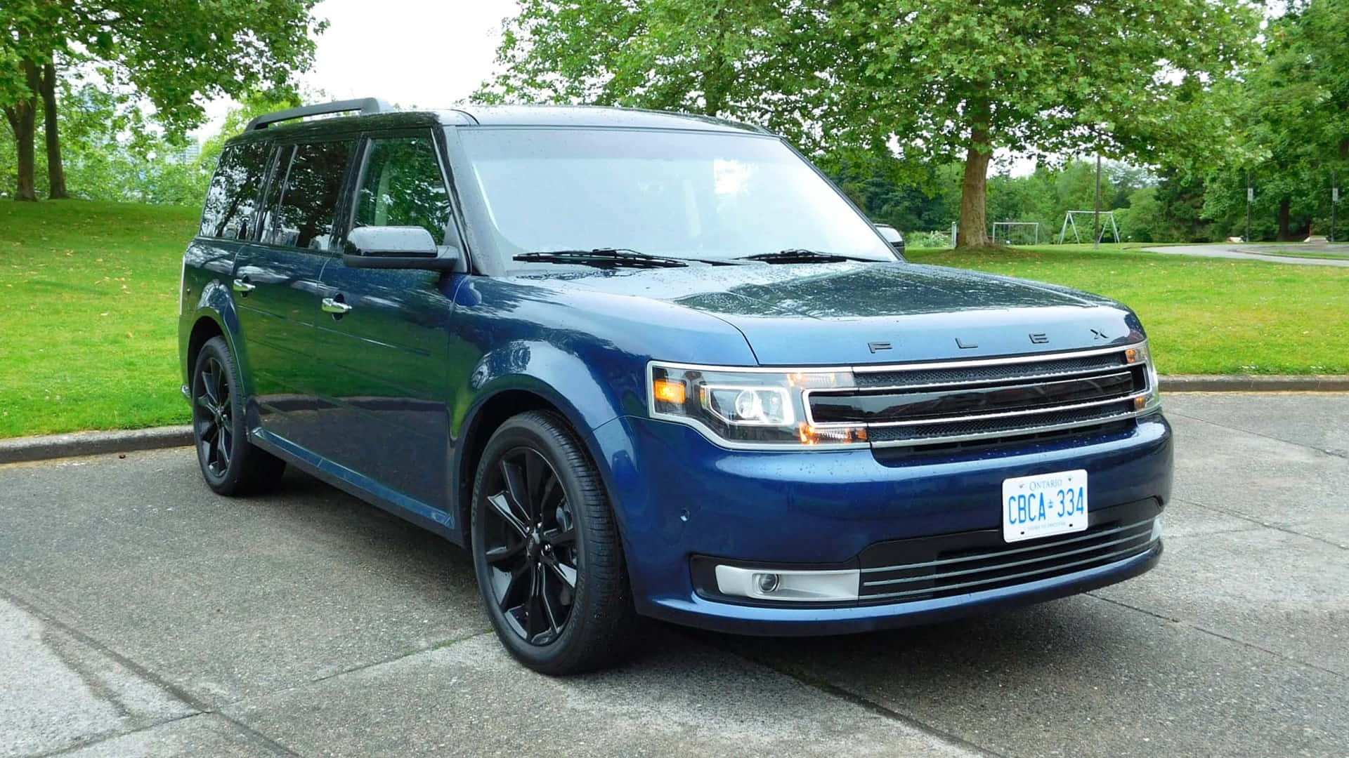 Sleek and Stylish Ford Flex cruising on the open road Wallpaper