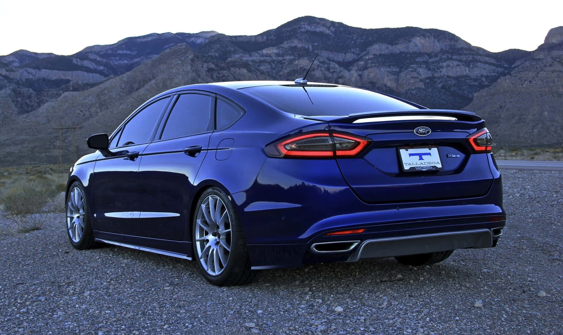 Sleek Ford Fusion on the open road Wallpaper