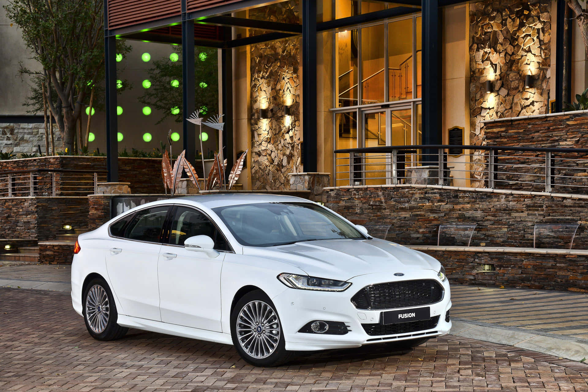 Sleek and Stylish Ford Fusion on the Road Wallpaper