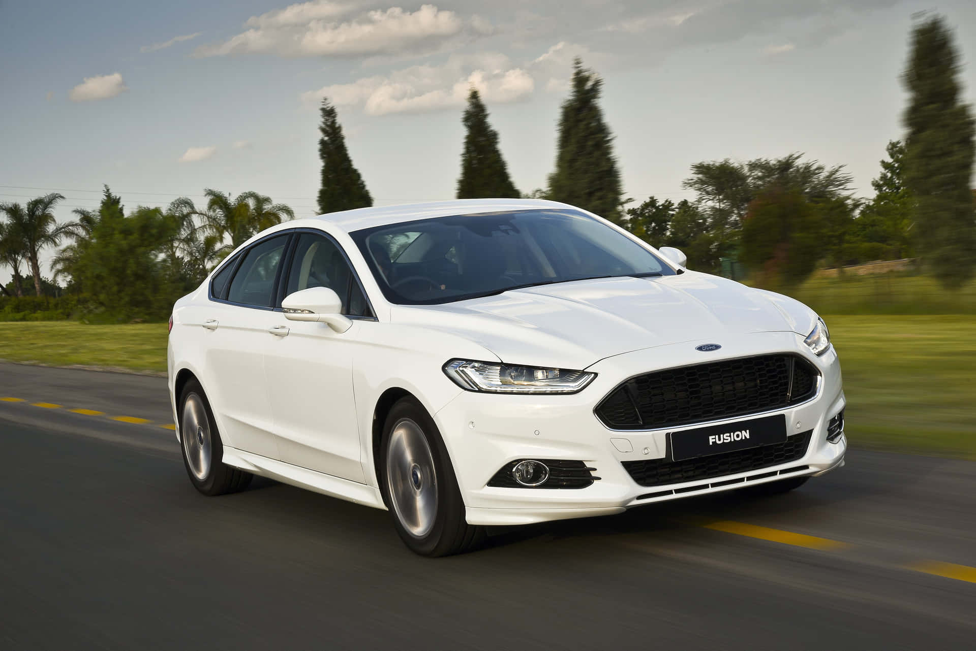 Sleek and Stylish Ford Fusion in Action Wallpaper