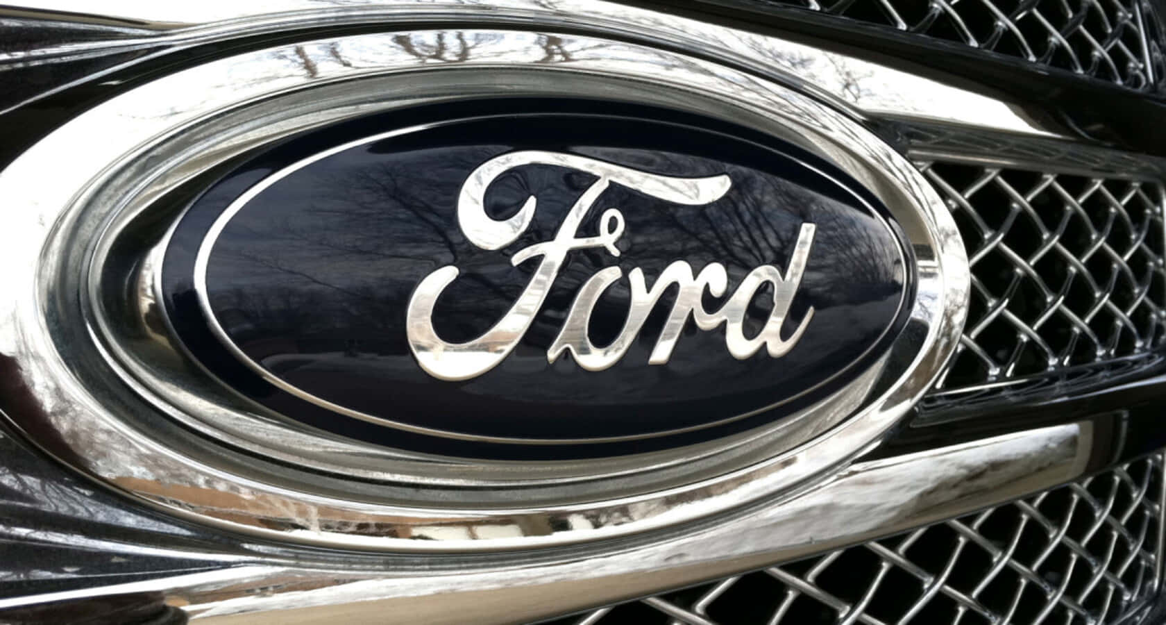 Emblemade Ford Sobre Un Fondo Brillante. Fondo de pantalla